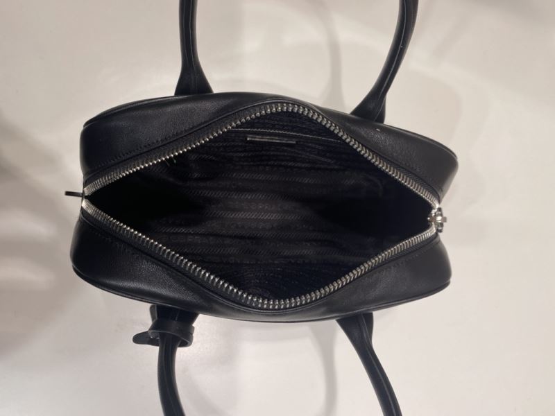 Pra*a top handle bags